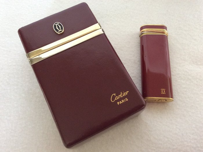 Cartier lighter and Cartier cigarette box, approx 1990.