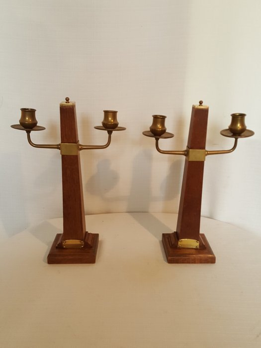 Two beautiful Amsterdam School Art Deco candlesticks with 2 light points of copper/brass