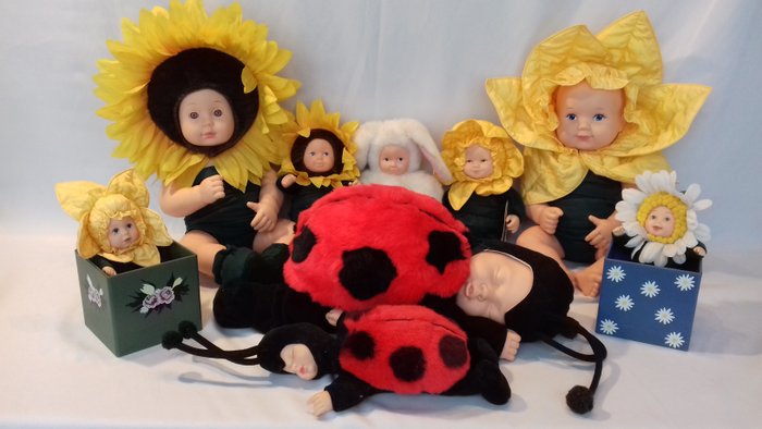 Collection of Anne Geddes dolls