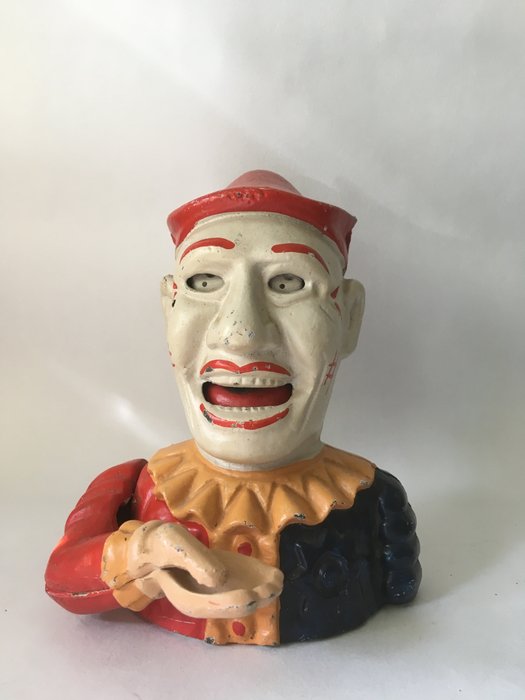 Cast iron coin snapper piggy bank clown - 20th century