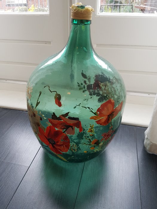 A hand-painted green Demijohn