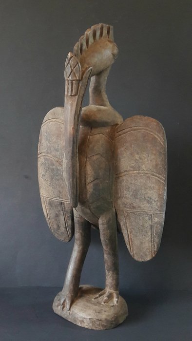 African image of a bird. Ibis - Wood