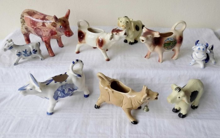 Various cows-milk jars-piggy bank and figurines (9) - Porcelain