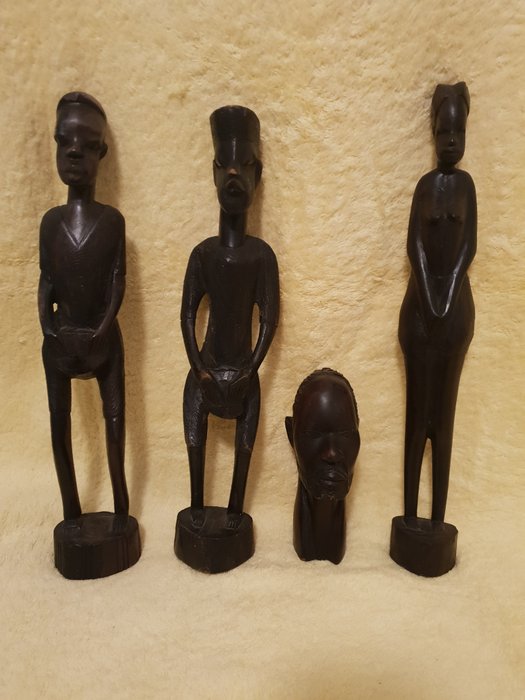 Serie van Vooruitgang Schrijf op Afrikaanse houten beelden - Hout - Catawiki