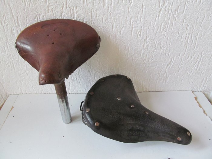 2 Old leather bicycle saddles - Wrights and Donza - Leather and metal