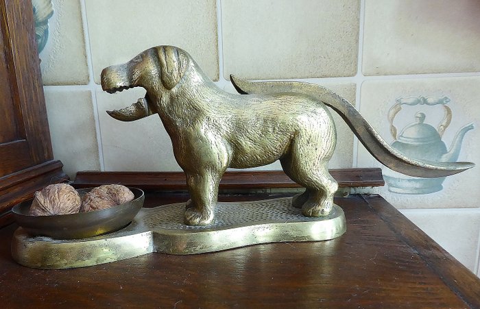 Vintage bronze table nutcracker in the shape of a dog - bronze