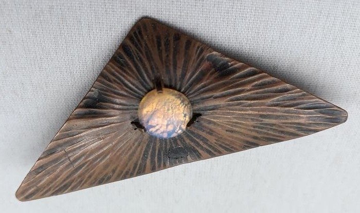 Amsterdam School copper brooch set with moonstone