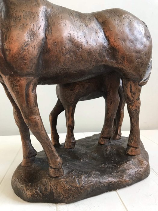 Austin Prod Inc - Sculpture - heavy cast material with bronze color