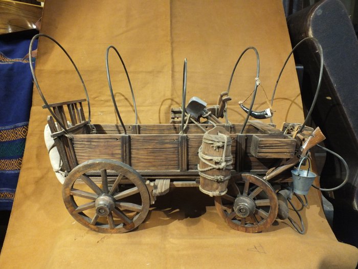 model of a pioneering western cart - wood and iron