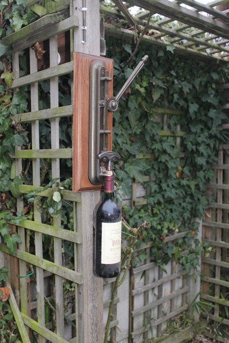 Wall-corkscrew, old wall mounted corkscrew - metal