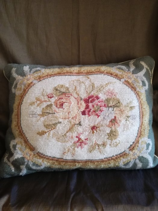 small embroidered pillow
