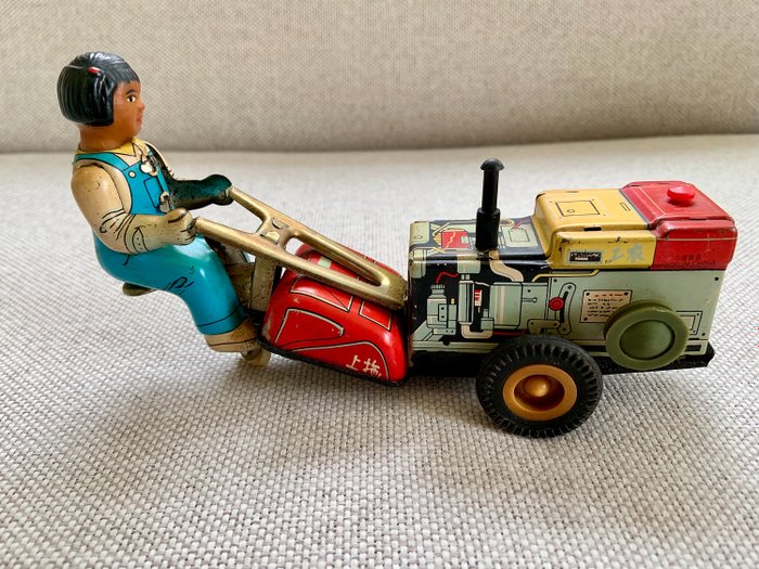 MS-857 - 60’s MS-857 Red China Special Duty Motorized Lawn Tractor Wind-up Tin Toy