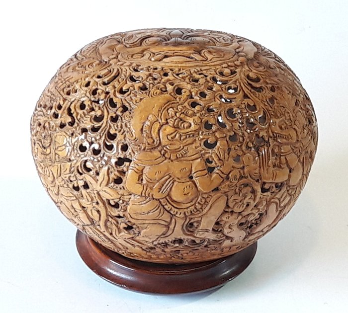 Finely chopped coconut with Balinese gods - Coconut shell - Bali, Indonesia 