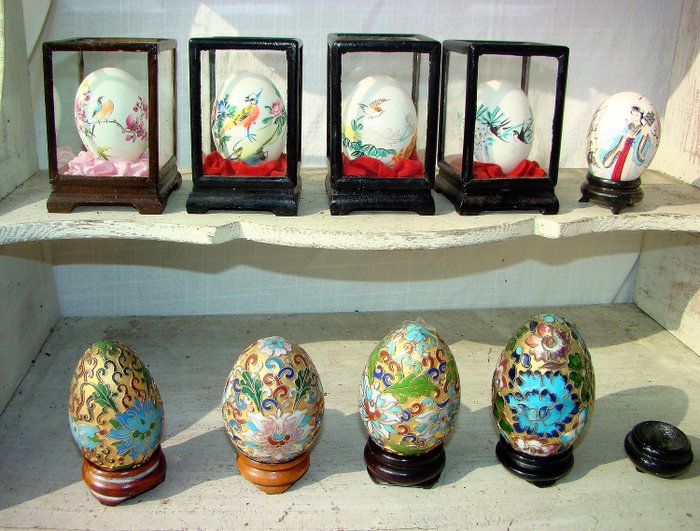 hand-painted eggs in glass cupboard and cloisonne eggs (9) - egg and copper