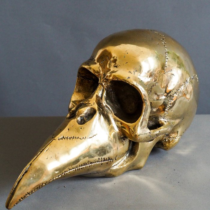 有鳥額嘴的古銅色人的頭骨 - 青銅色 - 印度尼西亞 