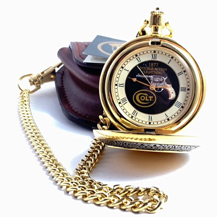 Franklin Mint - Rare Colt „1877 Double Action Lightning“ Pocket Watch  - 24 karat gold plated and metal in mint condition with leather bag and styrofoam box