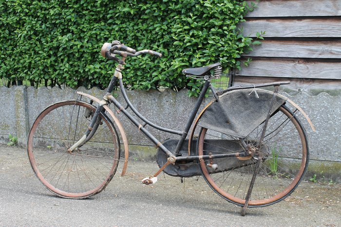antique bicycle with wooden rims and wooden fenders - metal and wood