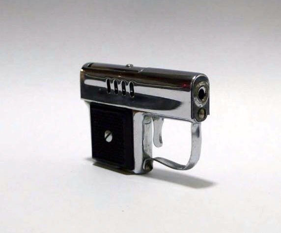 Corona - Gasoline cigarette lighter in the shape of a chromed metal gun