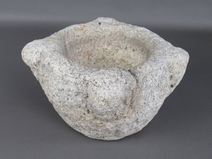 Muinainen graniitti kivi laasti