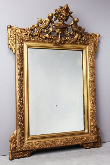 Antique gilt neoclassical mirror with putti and floral decoration - Wood / plaster - Ca. 1880