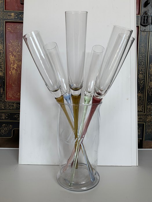 40 cm High elegant champagne flutes of various colored glass handles in ice cooler - Glass