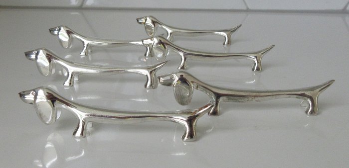 Six silver-plated knife dachshunds