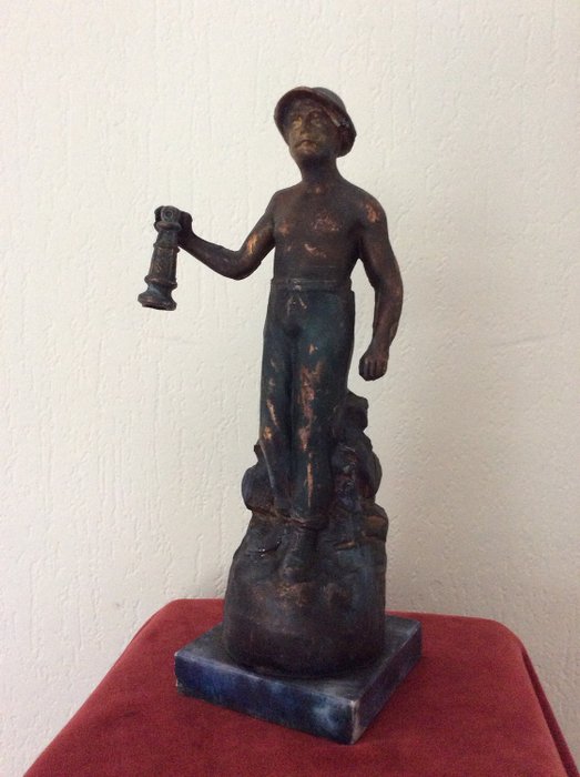Miner, - bronze painted in bronze