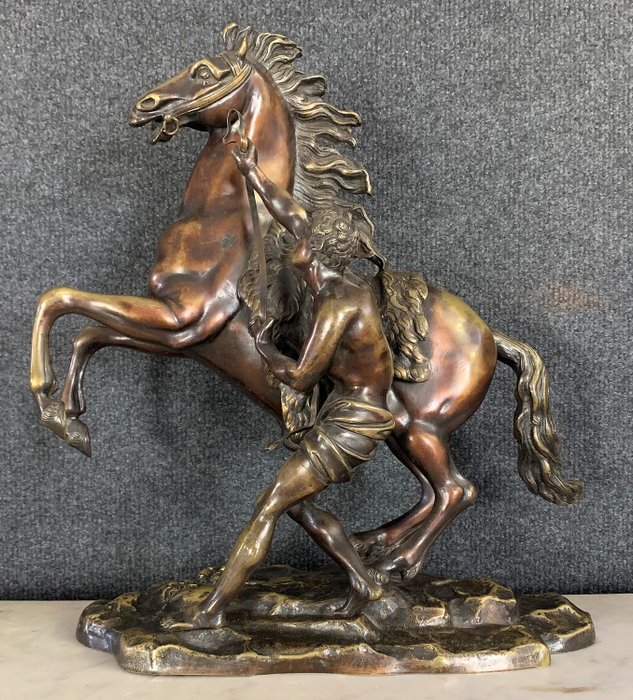 After Guillaume Coustou - Sculpture, "Marly's horse and her groom" - Bronze - Late 19th century