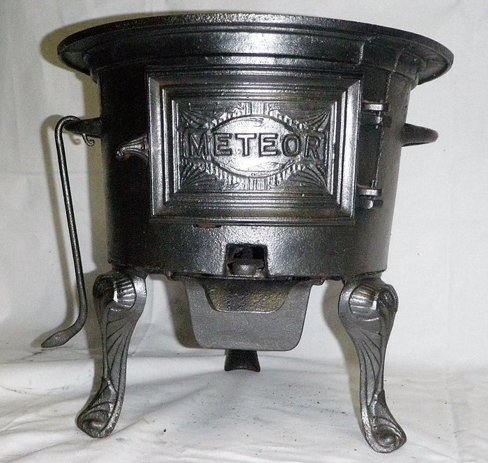 A cast iron pot heater - cast iron