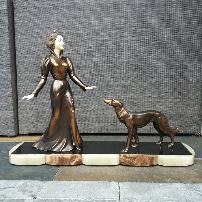 Art deco image of classic lady with her greyhound