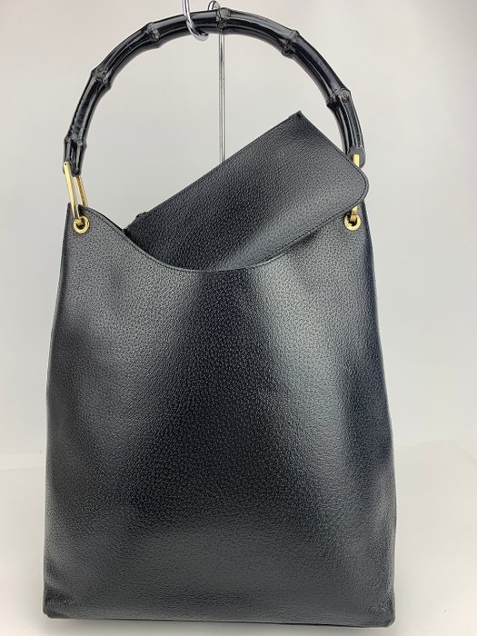 leather bag with bamboo handle