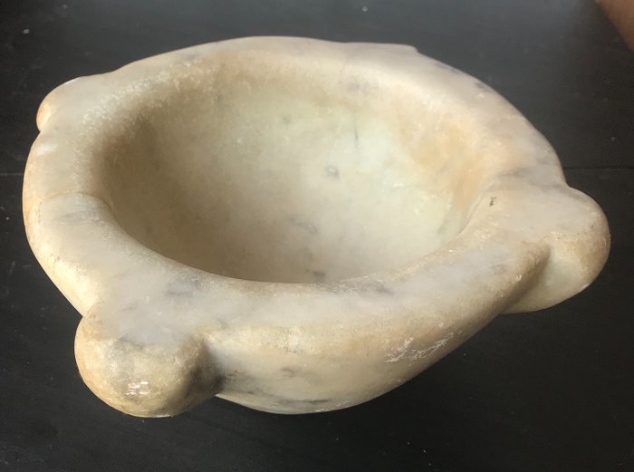 Antique white marble mortar dating back to 1800 made by hand in Italy.