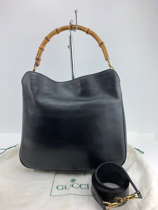 black leather gucci bag with bamboo handle