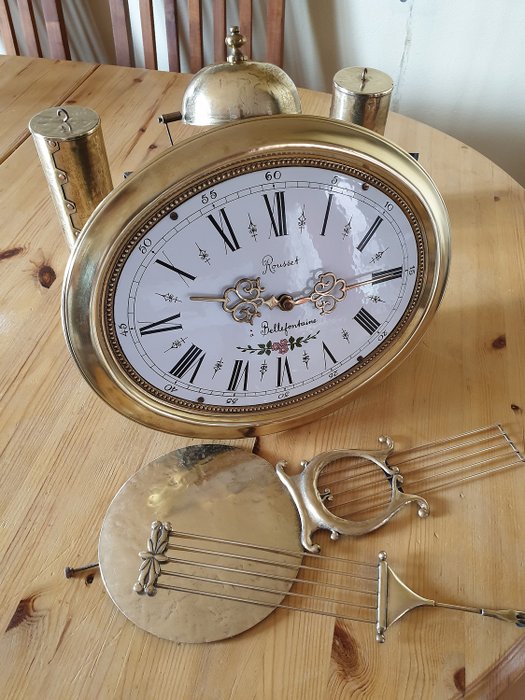 Relógio de parede oval modelo Comtoise - Rousset Bellefontaine - Frans Hermle - Chumbo, Cobre, Esmalte, Latão, metal - Segunda metade do século XX