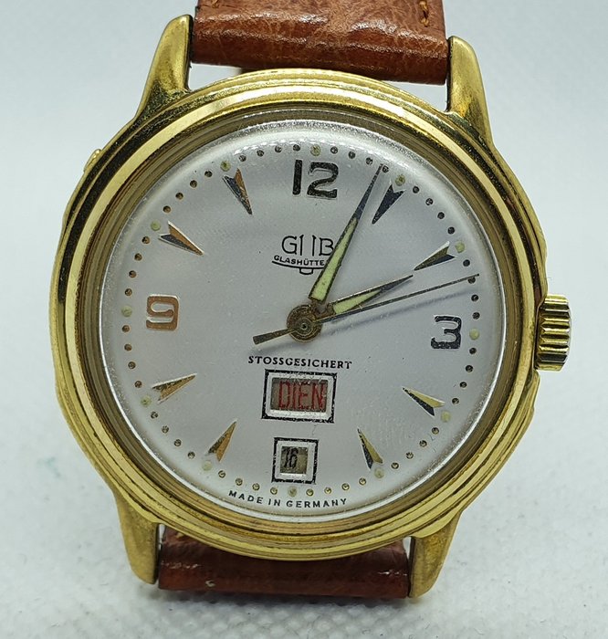 GUB Glashütte - Armbanduhr - Goldhaube - Kaliber 66.1 - Datum+Datumname - Herren - um 1959