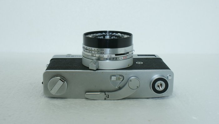 Canon Canonet ( 1961)  + paraattas + zonnekap+ lenskap