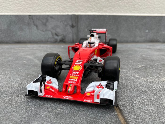 Preview of the first image of Bburago Luxe Version - 1:18 - Ferrari SF16-H Sebastian Vettel - Special Edition!.
