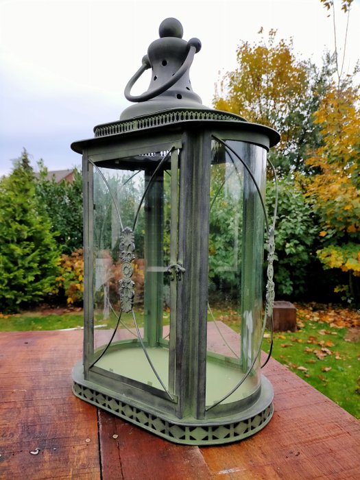A beautiful metal XXL lantern with beautiful details in antique green color - glass metal