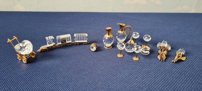 Swarovski-Figuren (15) - Kristall mit goldenen Akzenten
