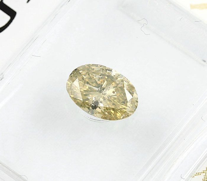 1 pcs Diamante - 0.74 ct - Ovalado - amarillo amarronado intenso fantasía - No mencionado en el certificado