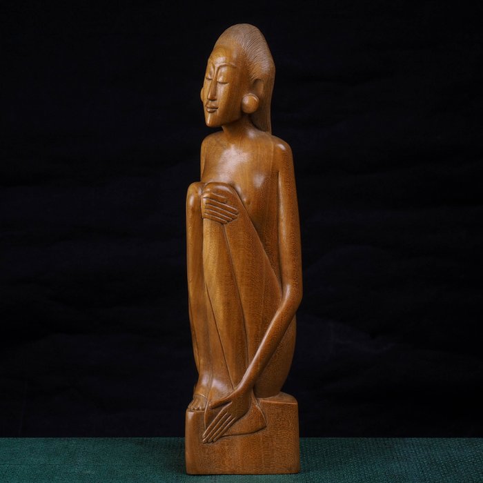 art deco style wood carving seated female figure - Lasi wood - Bali, Indonesia 