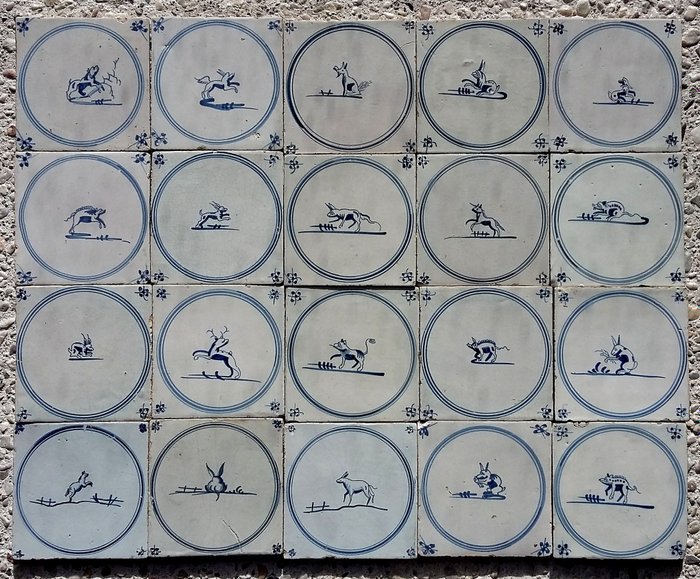 20 Delfts blauwe antieke tegels met dieren, zgn. springertjes. - Aardewerk