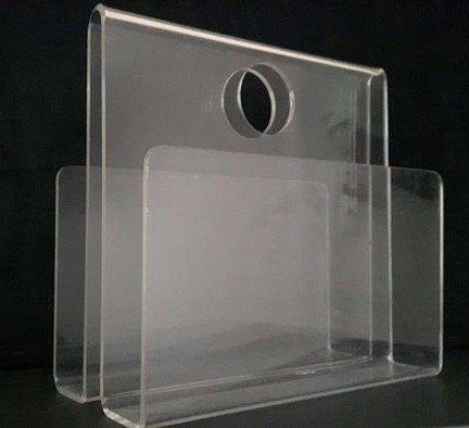 Revistero de plexiglás transparente vintage