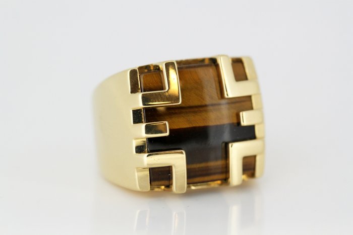 In other words three missile Cartier - 18 kt. Yellow gold - Ring Tigers Eye - Catawiki