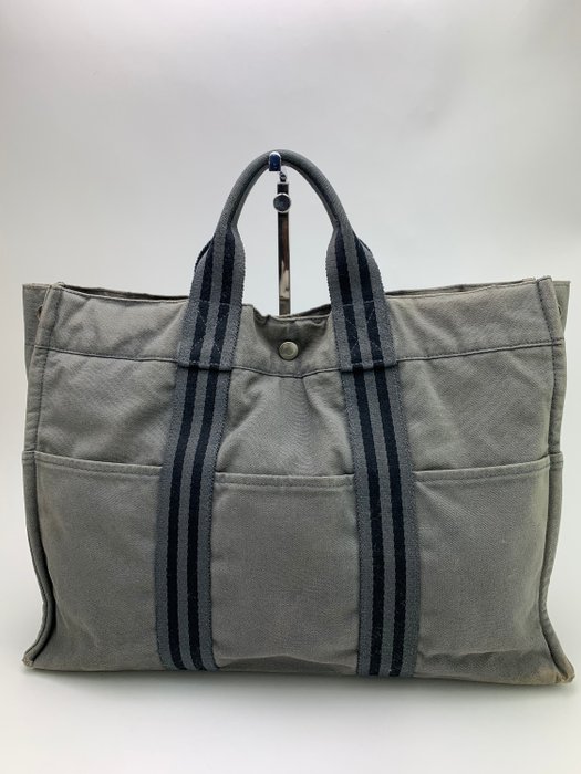 Hermès - NO RP Unisex Her-Line Grey Canvas GM Big Tote bag - Catawiki