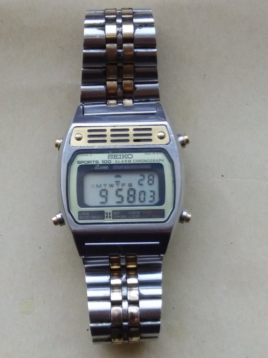 Seiko - Steel and Gold Digital LCD SPORTS 100 ALARM CHRONOGRAPH - A639 - 501A - Homme - 1980-1989