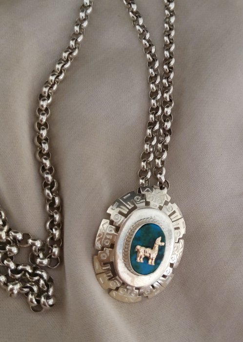 Silver - Vintage Peru llama pendant and brooch with a malachite stone on a long silver chain necklace