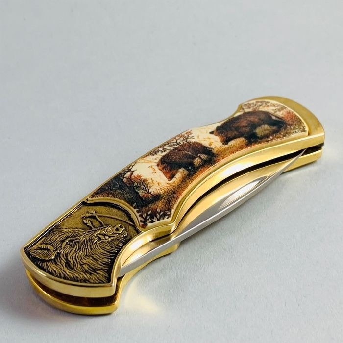 Franklin Mint - Collector Knives - Cuțit de vânătoare cu mistreț placat cu aur de 24 de carate - Stare foarte bună.