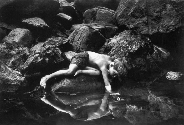 W. Eugene Smith (American, 1918-1978) - A boy reflecting in the water, 1950's