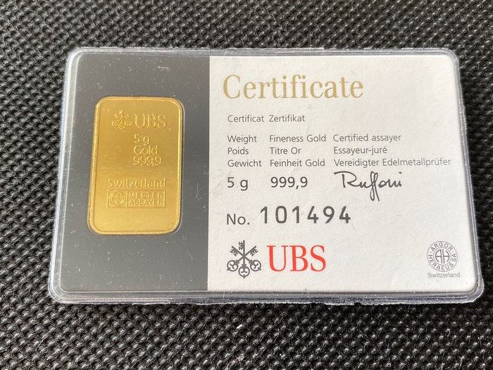 5 gram - Guld 999 (24 karat) - UBS Goldbarren Kinebar in schwarzen Blister  - segl+certifikat